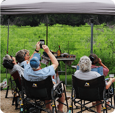 rvers seated on chairs