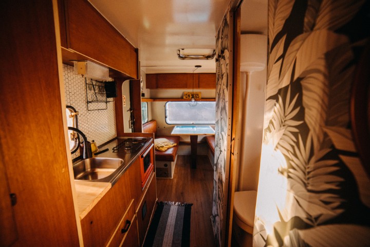 A warm and inviting RV interior with elegant decor, perfect for full-time living