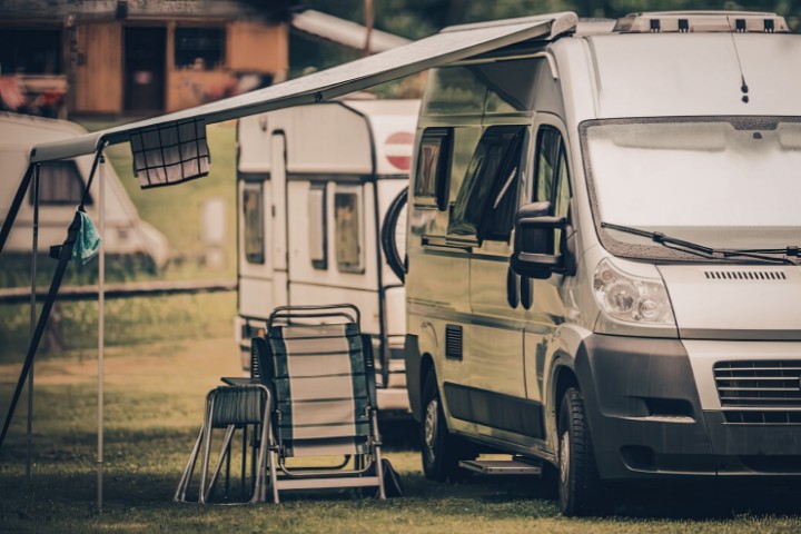 RV park living with camper awning setup