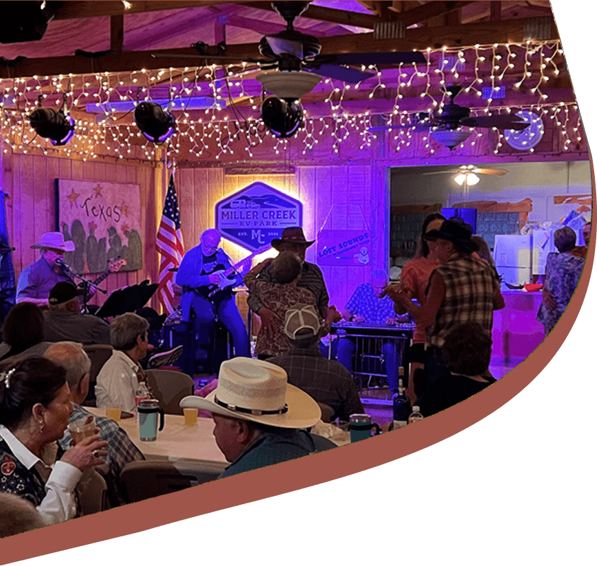 Guests enjoying live music at Miller Creek RV Park near Blanco, Texas
