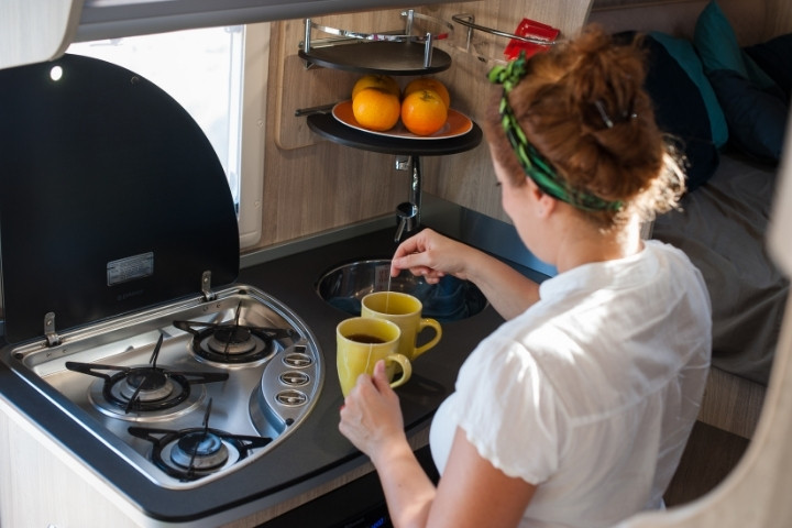 Using an RV kitchen sink and fresh water supply for cooking and drinking while camping