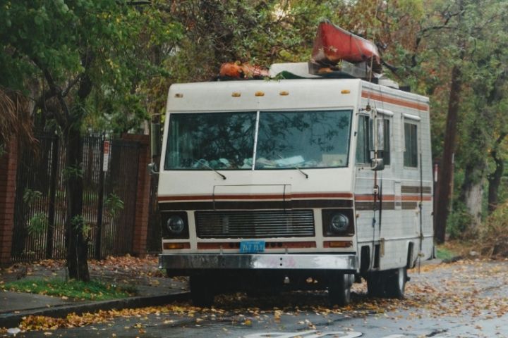 RV parked near a public roadway illustrating prohibited camping and parking considerations in Texas