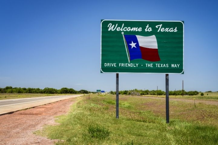 Welcome to Texas road sign marking the start of an RV trip through Texas