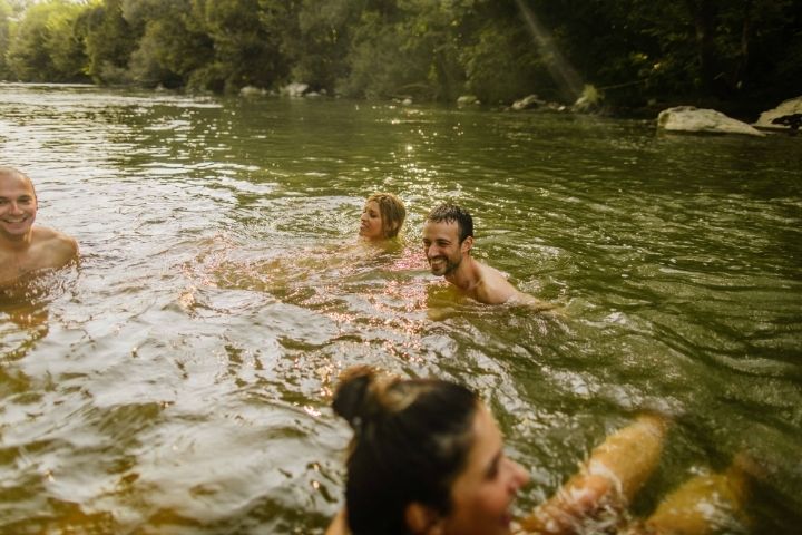 Swimmers enjoying the Blanco River in Blanco State Park