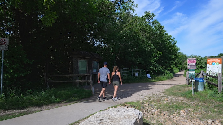 Couple walking into the Zilker/Barton Creek Greenbelt Trailhead